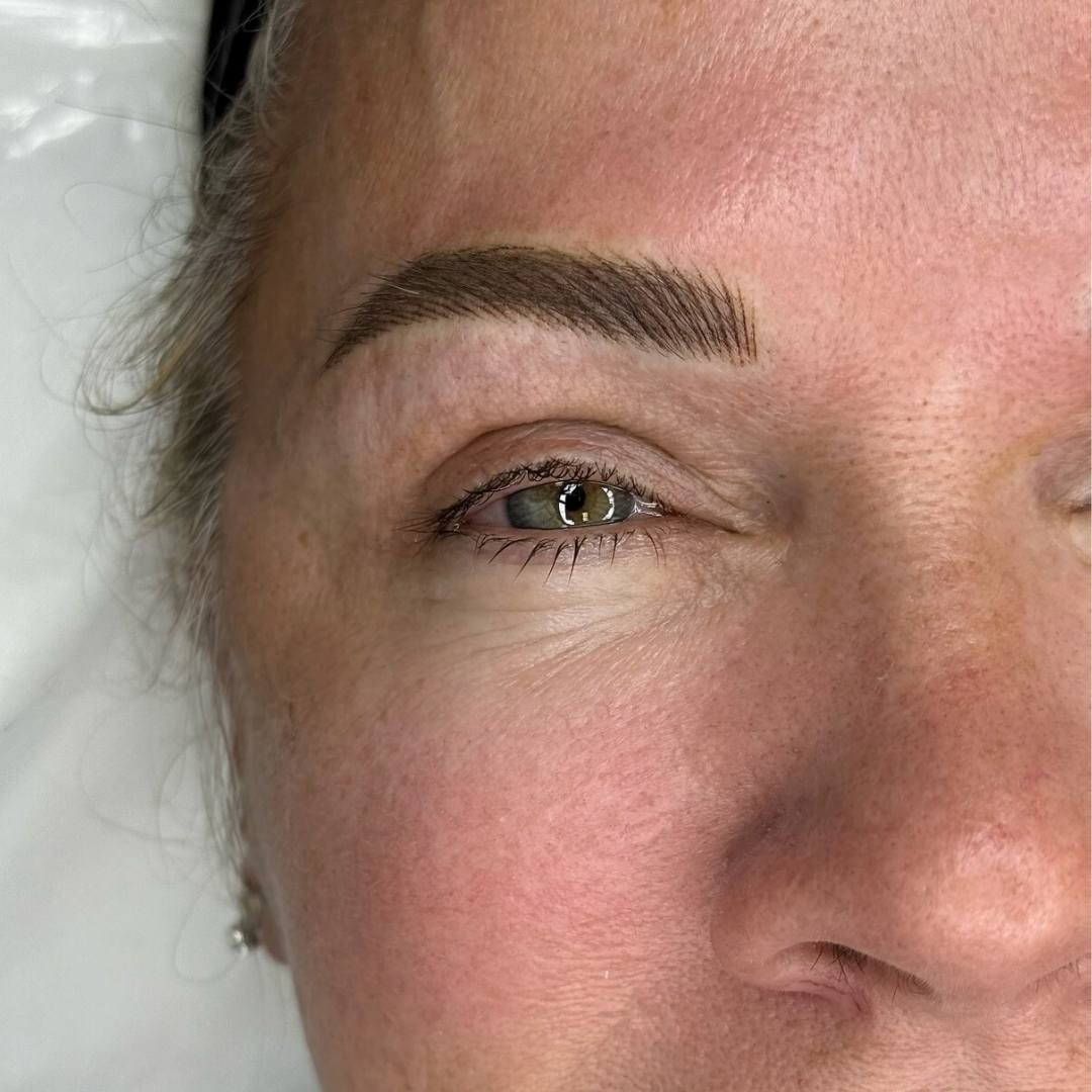 Woman with freshly done microblade eyebrows